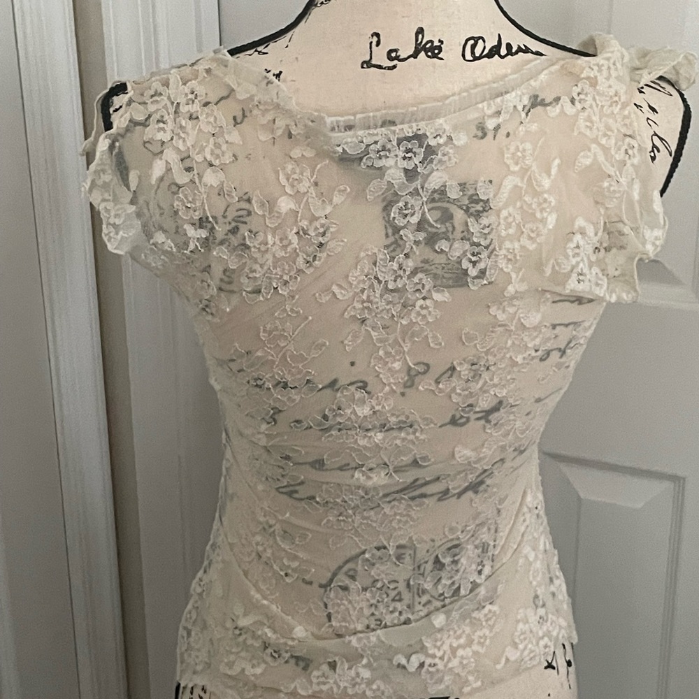 Sexy lace shirt.